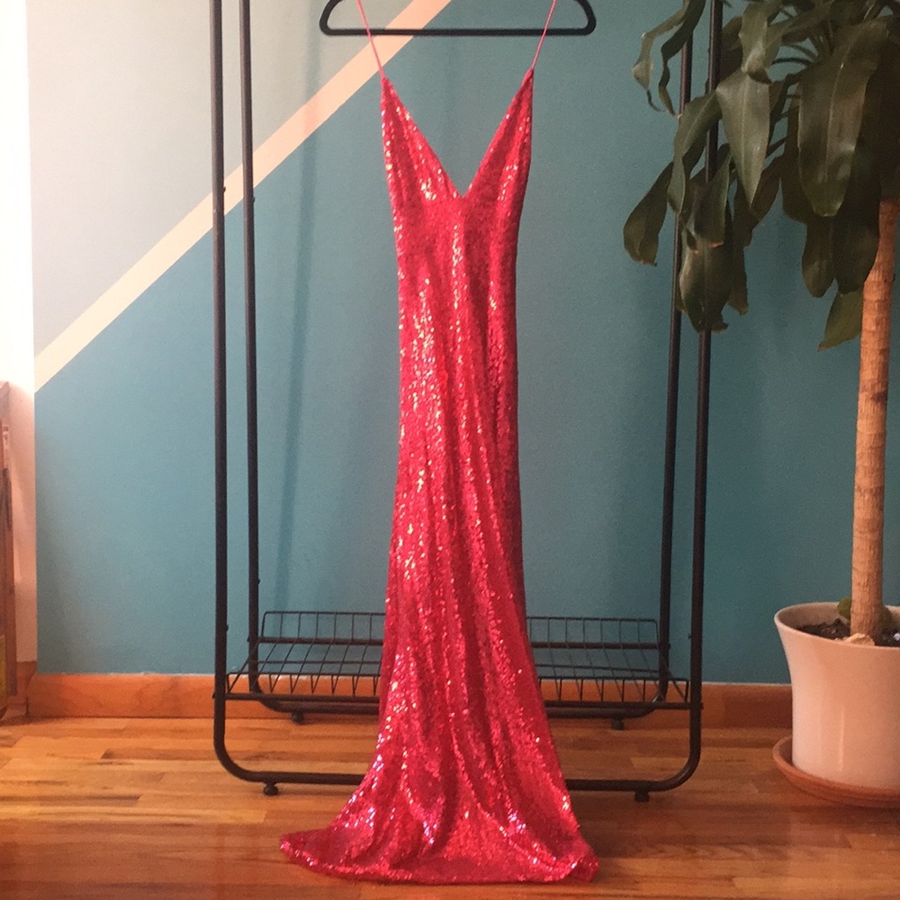 Hot pink sequined long spaghetti strap dress.